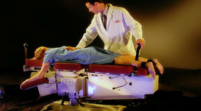 This is a picture of Cox Technic chiropratic spinal manipulation as performed at Pure Chiropractic.